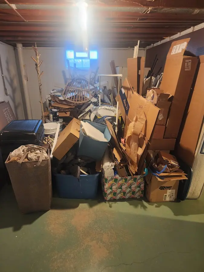 Roll-off dumpster container at job site for Yard Waste Dumpster Rental in West Point